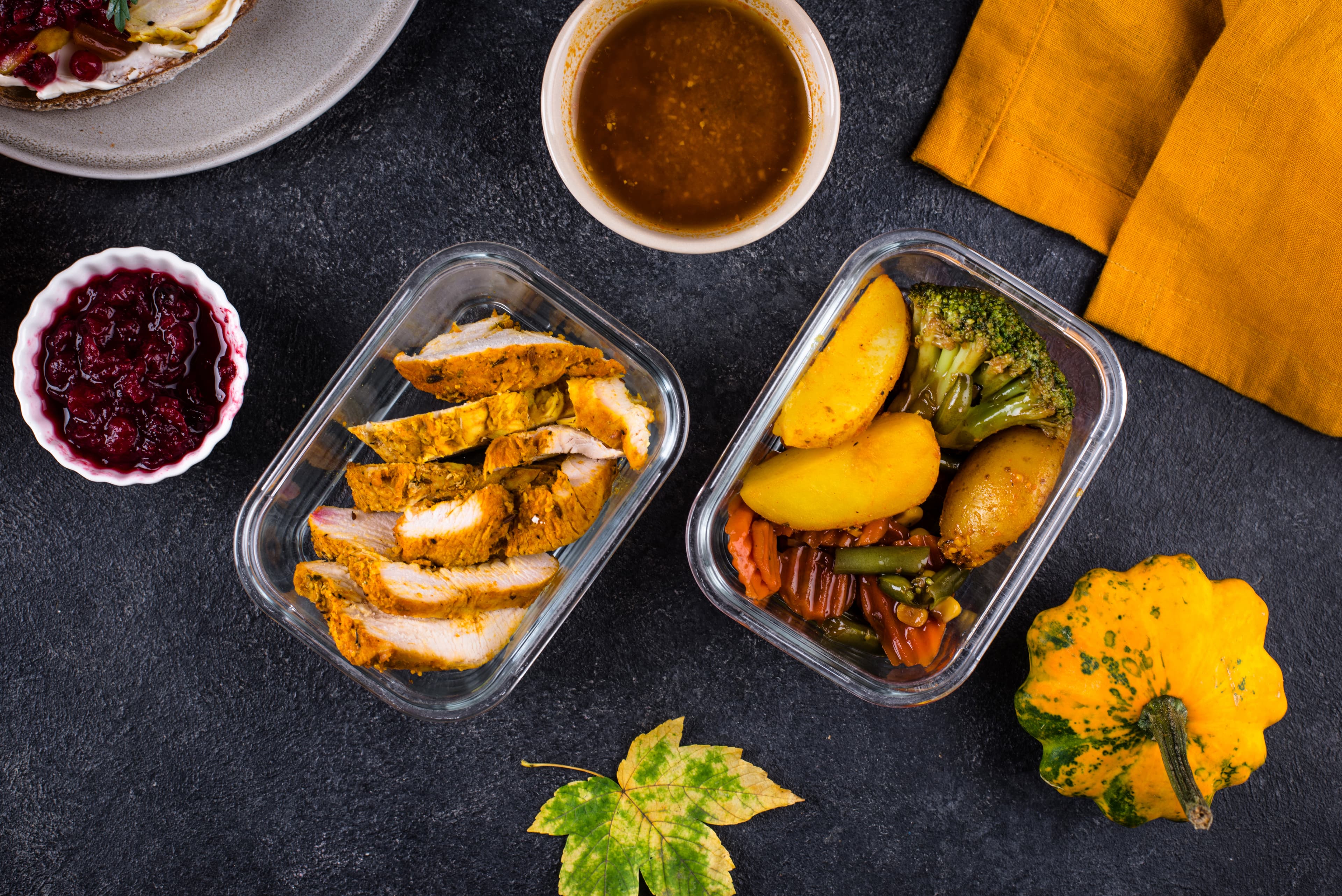 An overhead view of various dishes of food on a table